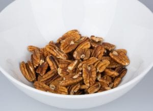 Pecans in a bowl, from a pecan tree nursery with variety of pecan trees for sale, wholesale and retail pecan tree sales.